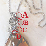 Client adjustments to custom wire wrapping jewelry project