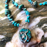 Closeup of tree - Handmade wire wrapped blue green silver and genuine turquoise beads necklace with tree pendant