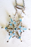 Wire wrapped snowflake pendant, handmade, silver, blue