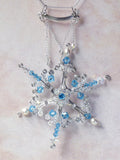Winter snowflake necklace. Blue topaz and sterling silver.