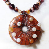 Beaded gemstone pendant rustic necklace orange & black