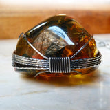 Bottom Amber & sterling silver custom wire wrapped setting