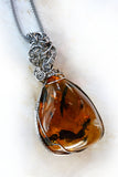 Amber & sterling silver custom wire wrapped setting