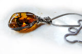 Alt side Amber & sterling silver custom wire wrapped setting