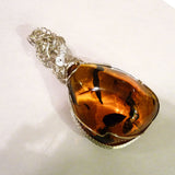 No patina Amber & sterling silver custom wire wrapping