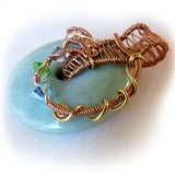 Wire wrapped donut gemstone, teal, copper, bronze&crystal