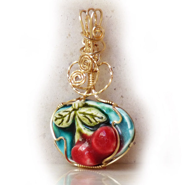 Porcelain Cherries Gold Filled pendant by Rhonda Chase.