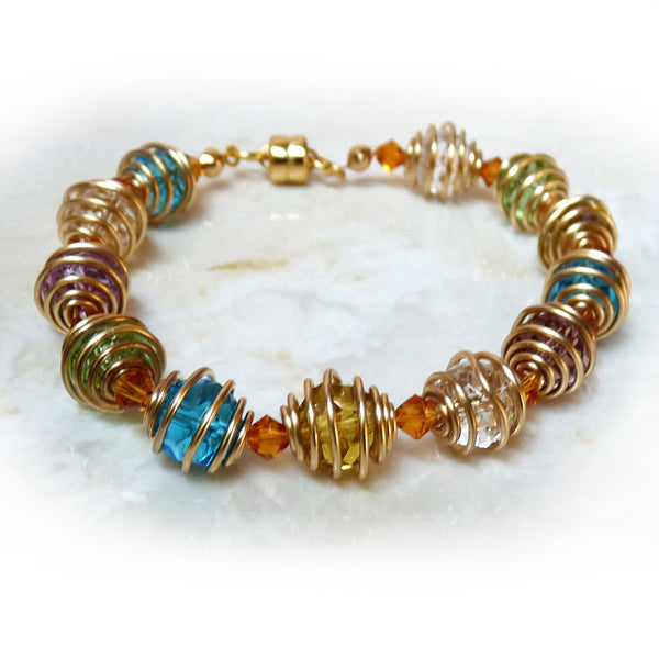 Colorful handmade wire wrapped bracelet. Crystal, bronze.