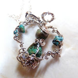 green, blue, silver, turquoise & sterling wire wrapped angel