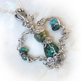 natural turquoise angel in an antiqued silver wire wrapped