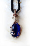 blue waves cats eye wire wrapped pendant necklace