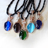 blue, green, purple cats eye wire wrapped pendants