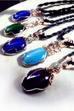 sides of 5 blue green purple cats eye wire wrap necklaces