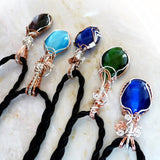 Tops of colorful cats eye silver & copper necklaces