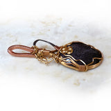 Blue Goldstone Wire Wrapped Pendant