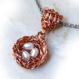 Handmade wire nest w freshwater pearl eggs, custom bail