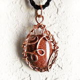 copper wire wrap pendant & shimmering brown goldstone