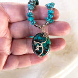 Pendant closeup - Handmade wire wrapped blue green silver and genuine turquoise beads necklace with tree pendant