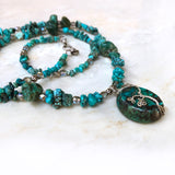 Side view Handmade wire wrapped blue green silver and genuine turquoise beads necklace with tree pendant