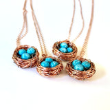 four examples Bird's Nest Pendant with Turquoise Eggs Handmade Copper Wire Wrapped necklaces