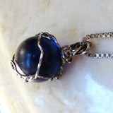 Handmade boho silver wire wrapped blue marble pendant