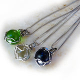 3 handmade silver wire wrapped marble pendants