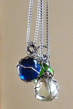 Boho chic silver wire wrapped blue glass marble pendant