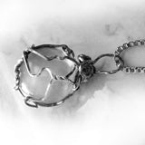 Handmade boho silver wire wrapped clear marble pendant