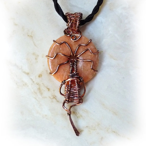 rustic salmon gemstone donut wire wrapped in copper wire