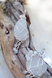 sea glass pendants on driftwood clear white sterling silver