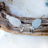 sea glass OOAK pendant necklaces on driftwood