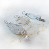 Handmade boho wire wrapped sea glass silver pendants