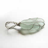 Handmade boho wire wrapped green sea glass pendant
