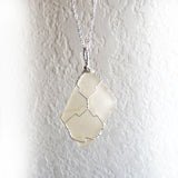wire wrapped real sea glass in sterling silver, beautiful gift