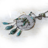 Sterling silver & turquoise wire wrapped pendant necklace