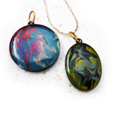 Black and green hand painted pendant by Rhonda Chase