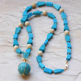 blue chalk turquoise necklace with sphere, gold filled wire