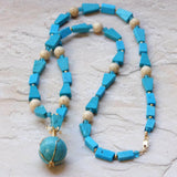 blue chalk turquoise necklace with sphere, gold filled wire