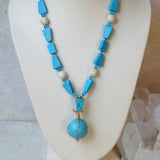 blue chalk turquoise with globe and gold filled necklace
