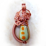 Antique green Chinese bead & copper wire wrap pendant