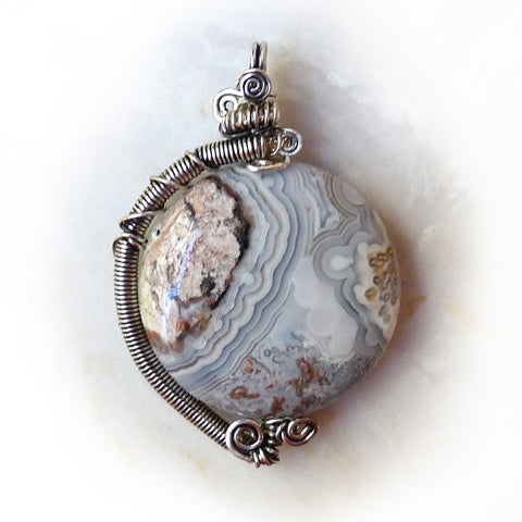 Round Crazy Lace Agate grey & rust Wire Wrapped Pendant