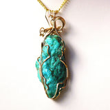 Green natural turquoise nugget wire wrap gold pendant